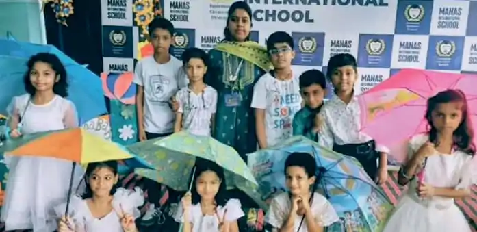 Sawaan Program students with umbrellas